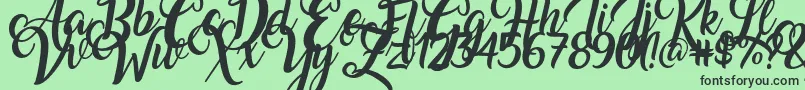 フォントAmarillo – 緑の背景に黒い文字