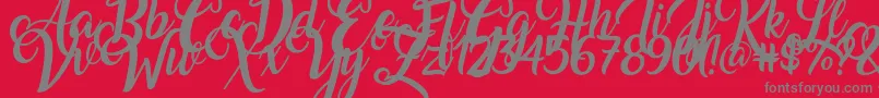 フォントAmarillo – 赤い背景に灰色の文字