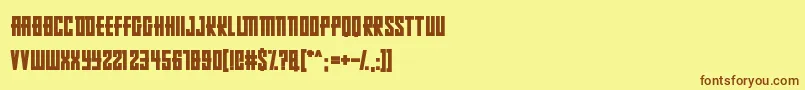 フォントRussianDollmaker – 茶色の文字が黄色の背景にあります。