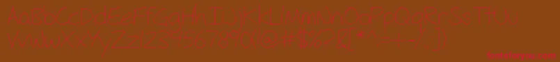 FhHyperboleLight Font – Red Fonts on Brown Background