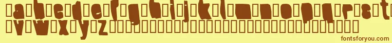 フォントSplumpBlack – 茶色の文字が黄色の背景にあります。