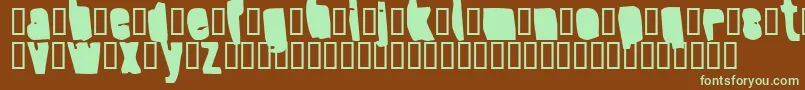 フォントSplumpBlack – 緑色の文字が茶色の背景にあります。