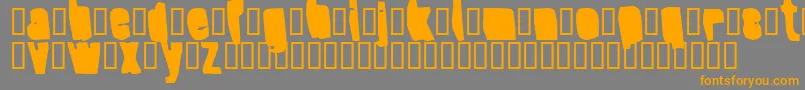 フォントSplumpBlack – オレンジの文字は灰色の背景にあります。