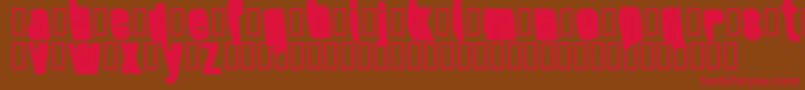 フォントSplumpBlack – 赤い文字が茶色の背景にあります。