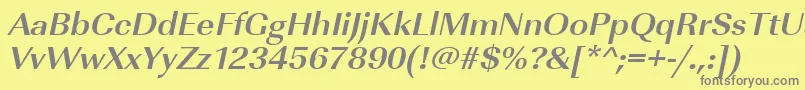 UrwimperialtwidBoldOblique-fontti – harmaat kirjasimet keltaisella taustalla