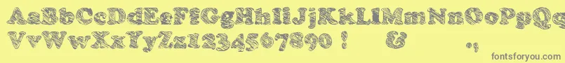 Skooper-Schriftart – Graue Schriften auf gelbem Hintergrund