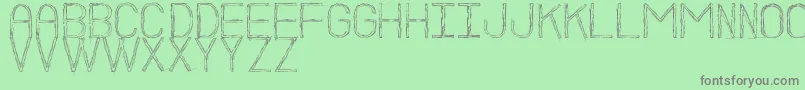 BocetoSt Font – Gray Fonts on Green Background