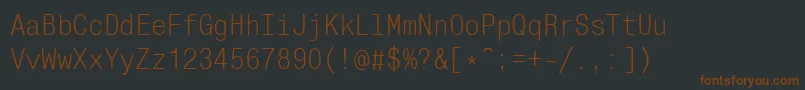 fuente MonocondensedcRegular – Fuentes Marrones Sobre Fondo Negro