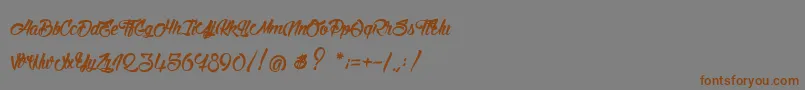 フォントStinkOnTheDeath – 茶色の文字が灰色の背景にあります。