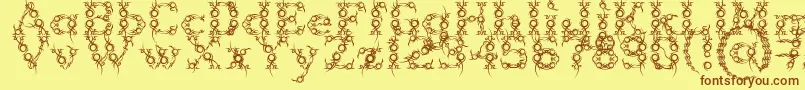Czcionka Tribou – brązowe czcionki na żółtym tle