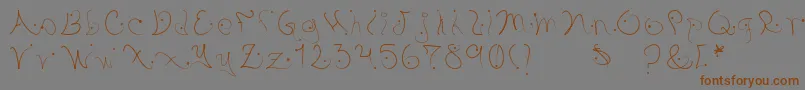 Pystil Font – Brown Fonts on Gray Background