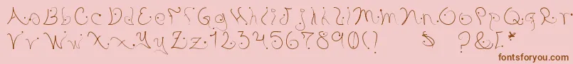 Pystil Font – Brown Fonts on Pink Background