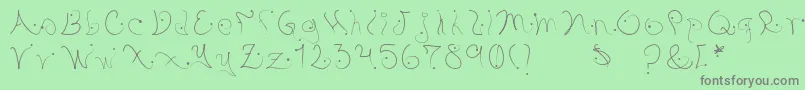 Pystil Font – Gray Fonts on Green Background