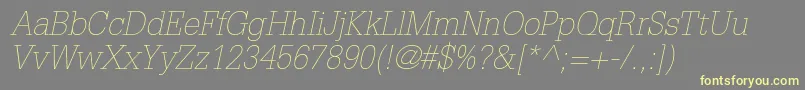 GlyphaltstdThinoblique Font – Yellow Fonts on Gray Background