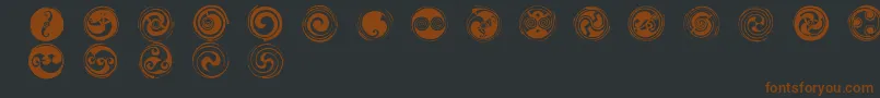 Fonte SpiralsRegular – fontes marrons em um fundo preto