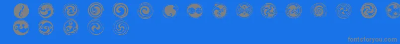 Czcionka SpiralsRegular – szare czcionki na niebieskim tle