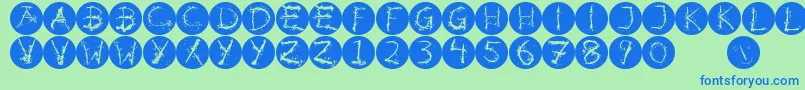 Inkalphabetinvers-fontti – siniset fontit vihreällä taustalla