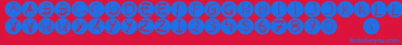 フォントInkalphabetinvers – 赤い背景に青い文字
