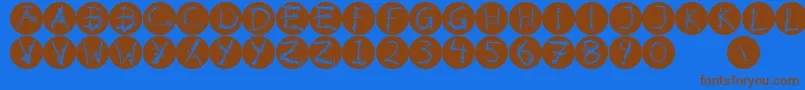 Inkalphabetinvers-fontti – ruskeat fontit sinisellä taustalla