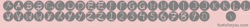 Inkalphabetinvers-Schriftart – Graue Schriften auf rosa Hintergrund
