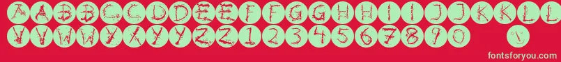 Inkalphabetinvers-fontti – vihreät fontit punaisella taustalla