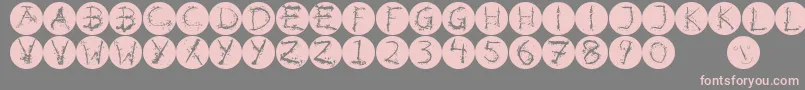 フォントInkalphabetinvers – 灰色の背景にピンクのフォント