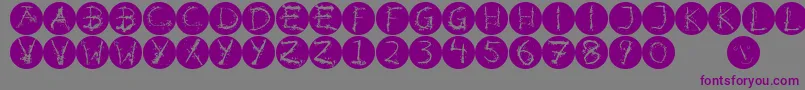 フォントInkalphabetinvers – 紫色のフォント、灰色の背景
