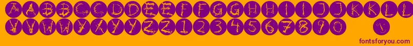 Inkalphabetinvers-fontti – violetit fontit oranssilla taustalla