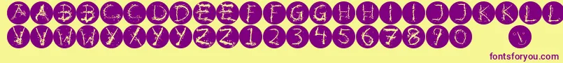 フォントInkalphabetinvers – 紫色のフォント、黄色の背景