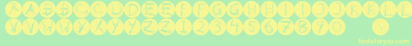 Inkalphabetinvers-fontti – keltaiset fontit vihreällä taustalla