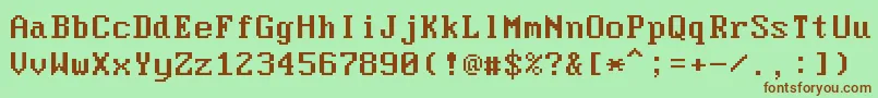 ModerDos437-fontti – ruskeat fontit vihreällä taustalla
