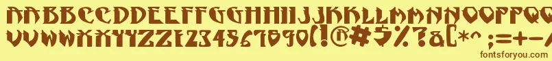 フォントNadcPsygnotic – 茶色の文字が黄色の背景にあります。