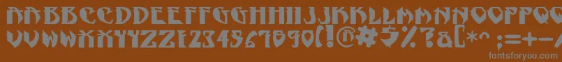 フォントNadcPsygnotic – 茶色の背景に灰色の文字