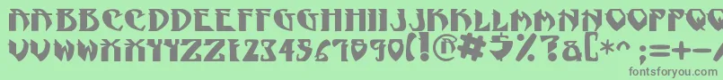 フォントNadcPsygnotic – 緑の背景に灰色の文字