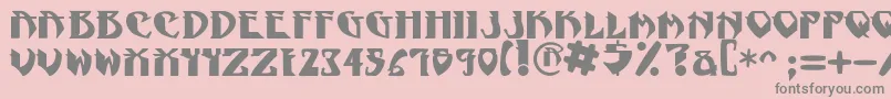 NadcPsygnotic-fontti – harmaat kirjasimet vaaleanpunaisella taustalla