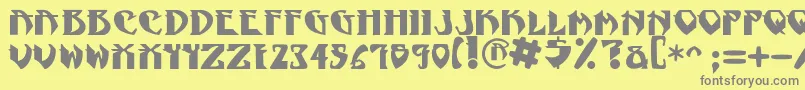 フォントNadcPsygnotic – 黄色の背景に灰色の文字