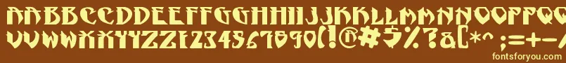 NadcPsygnotic-fontti – keltaiset fontit ruskealla taustalla