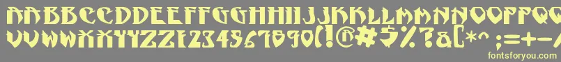 NadcPsygnotic-fontti – keltaiset fontit harmaalla taustalla