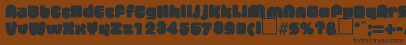 MisterbigRegularDb Font – Black Fonts on Brown Background