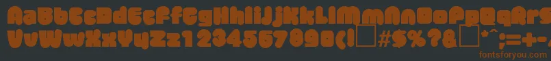 MisterbigRegularDb-fontti – ruskeat fontit mustalla taustalla