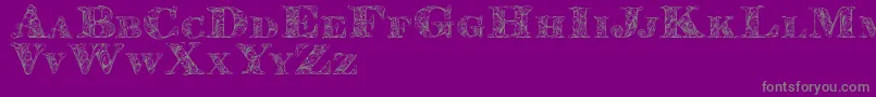 Kahirpersonaluse-fontti – harmaat kirjasimet violetilla taustalla