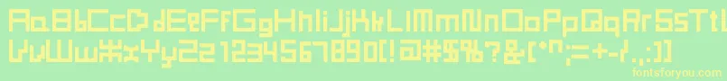 Obelus Font – Yellow Fonts on Green Background
