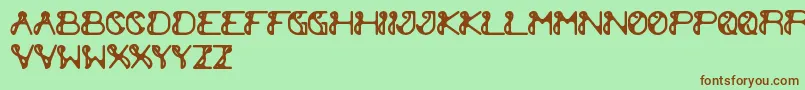 ExtraCheese Font – Brown Fonts on Green Background