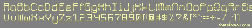 Galacticspaceport Font – Yellow Fonts on Gray Background