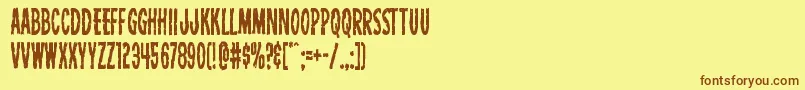 フォントCarnivalcorpsecond – 茶色の文字が黄色の背景にあります。