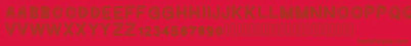 Ginumber1-Schriftart – Braune Schriften auf rotem Hintergrund