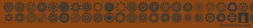 WachOpArtSymbols-Schriftart – Schwarze Schriften auf braunem Hintergrund
