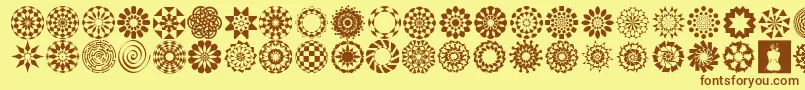WachOpArtSymbols Font – Brown Fonts on Yellow Background