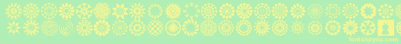 Czcionka WachOpArtSymbols – żółte czcionki na zielonym tle