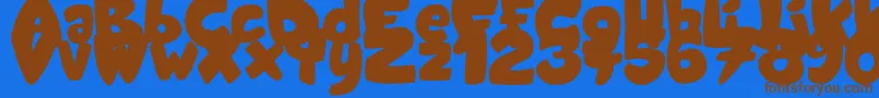 フォントCandyShopBlack – 茶色の文字が青い背景にあります。